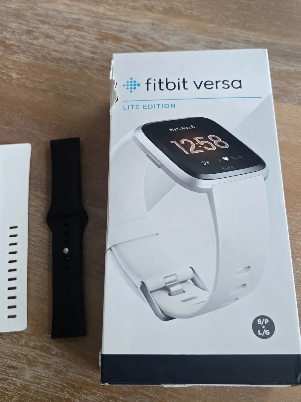Fitbit Versa Lite Edition White and Silver Smartwatch with Touchscreen, Women's